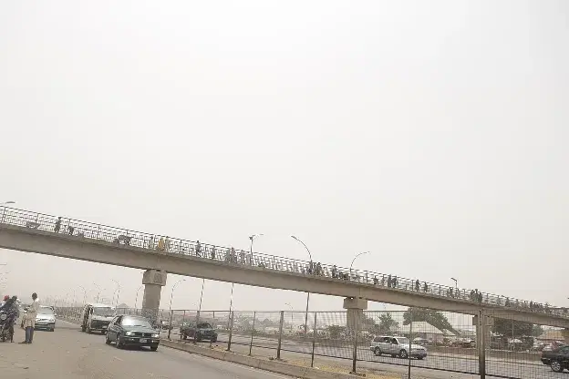 A pedestrian bridge over a road in Abuja